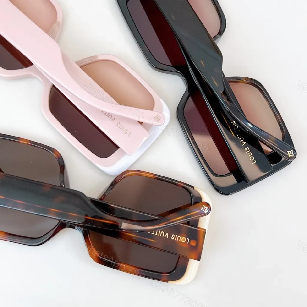 View 6 of Bold Black & White Frame Sunglasses with LV Detailing Luxe