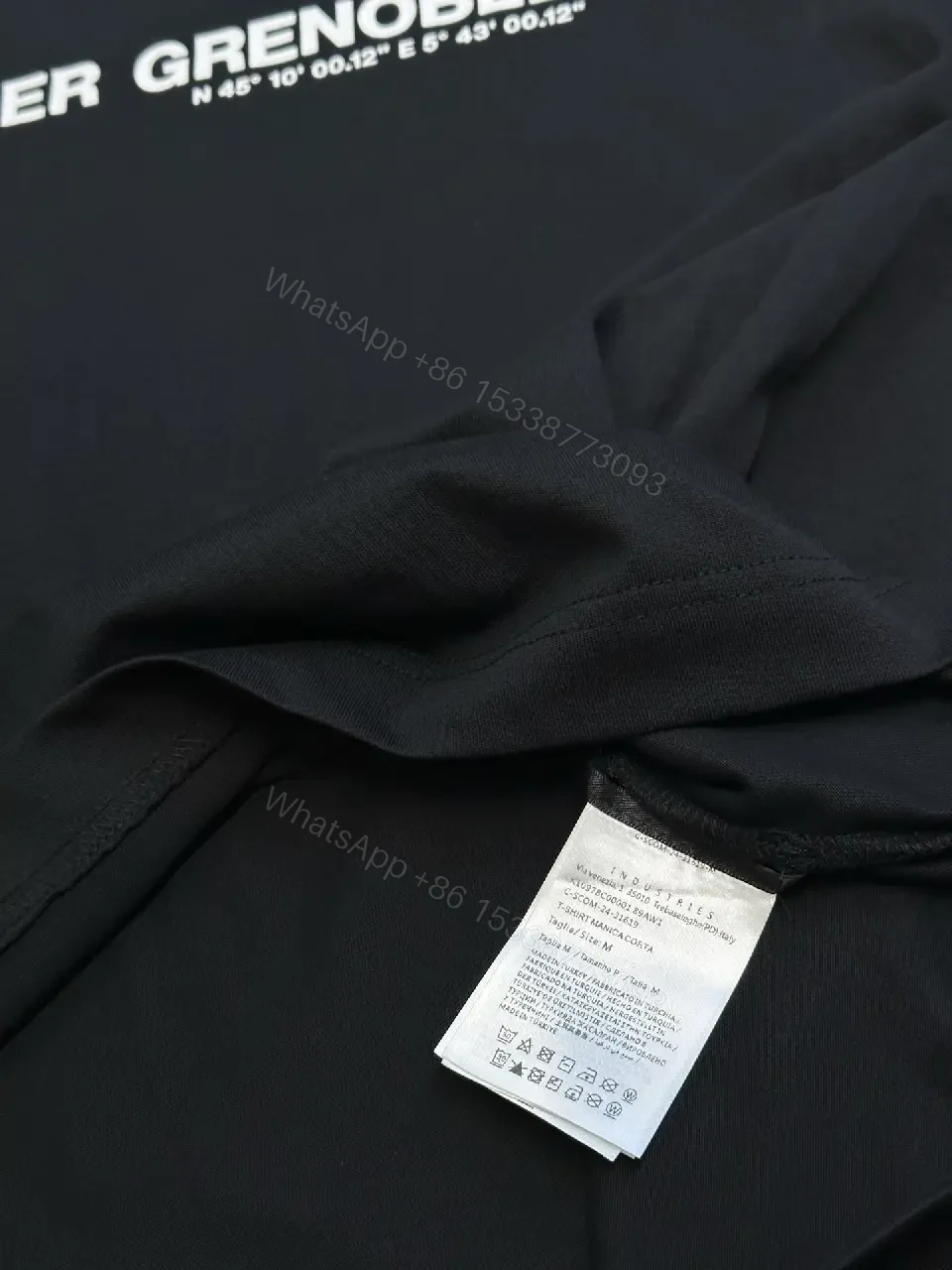 View 11 of Minimalist Black Tee with Logo Crest, Relaxed Fit, Premium Cotton