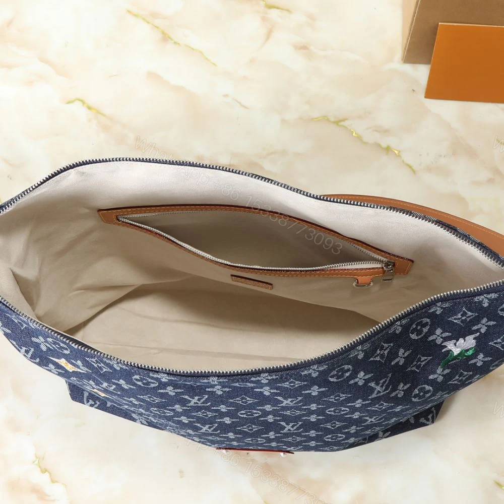 View 9 of Louis Vuitton Vagabond Hobo Denim Blue 48Cm M27555