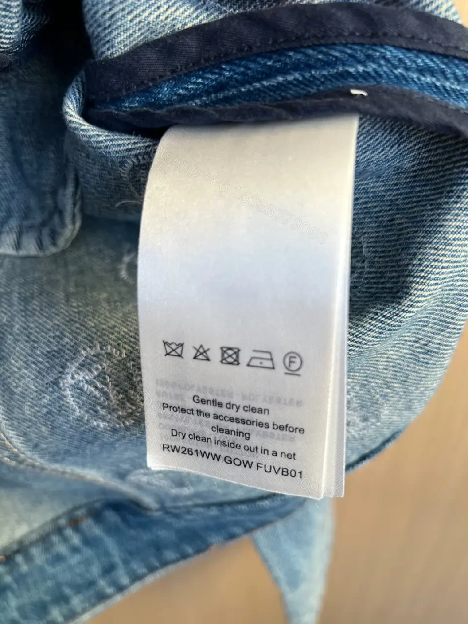 View 4 of Blue denim jacket with monogram print for everyday luxury casualwear