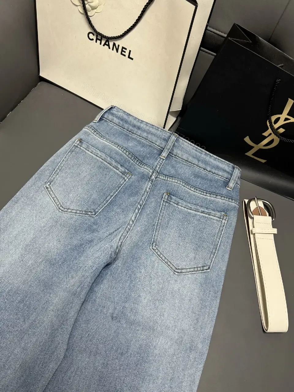 View 8 of Chic Distressed Couture: Wide-Leg Jeans with Emblems