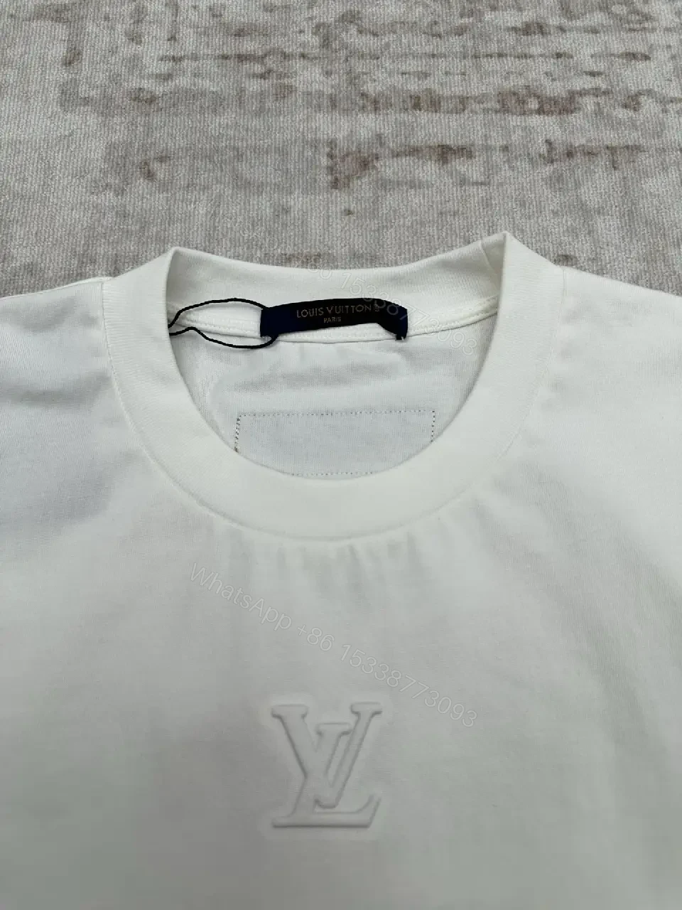 View 5 of Minimalist Luxe White Crewneck with Subtle Embossed DetailTop