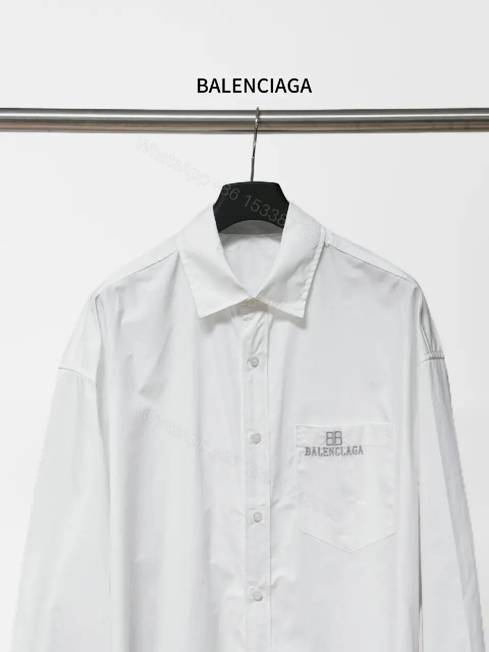 View 2 of Minimalist Button-Front Shirt with Subtle Logo Detail