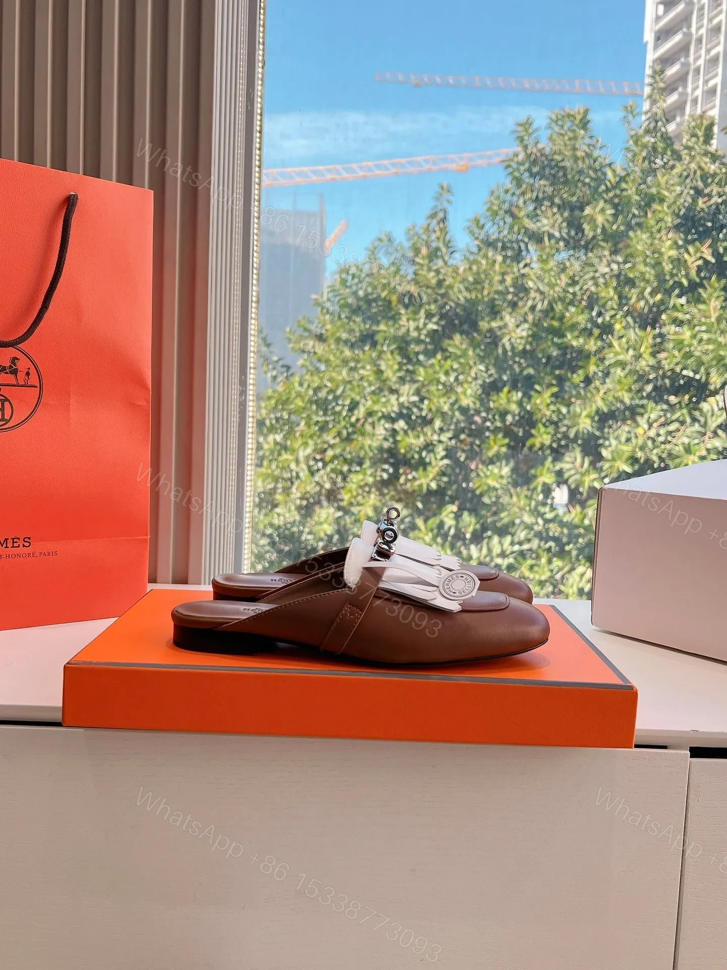 View 2 of Hermes Women Brown White Leather Fringe Mules