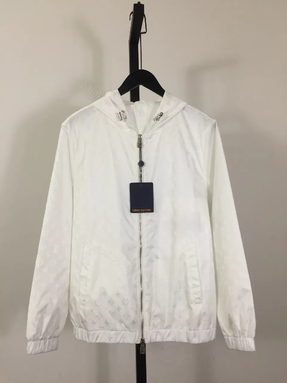 White Zip-Front Jacket with Subtle Monogram Texture — view 1
