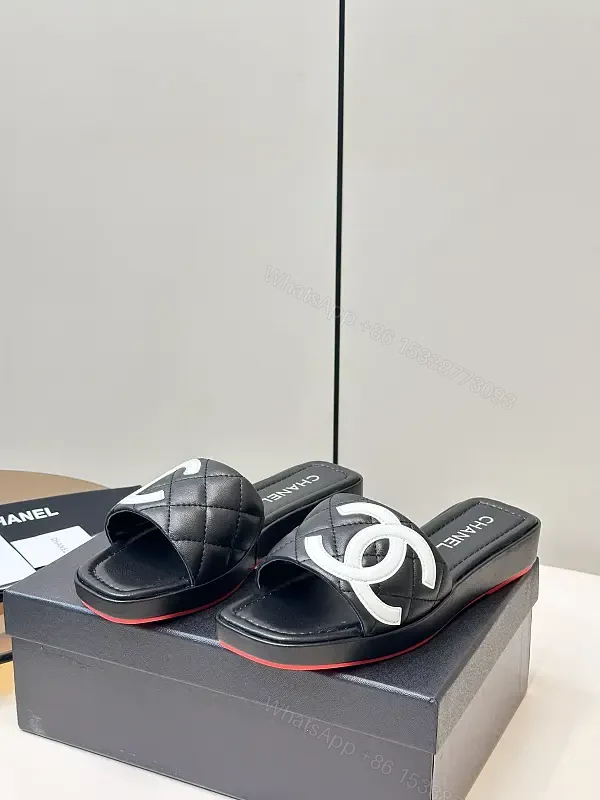 Black Quilted Chanel Sliders with White Logo, Slide Sandals — view 1