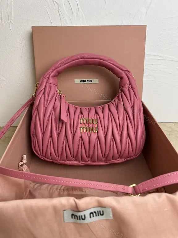 Pink Quilted Miu Miu Mini Bag – Luxury Everyday Chic — view 1