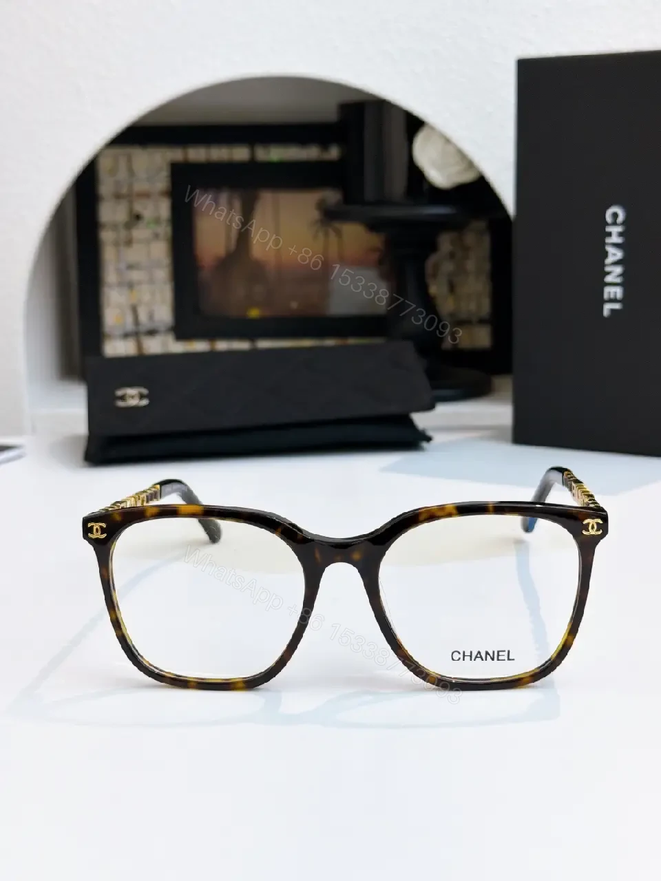 View 5 of Clear Translucent Frame Modern Oversized Sunglasses with CHANEL Accents