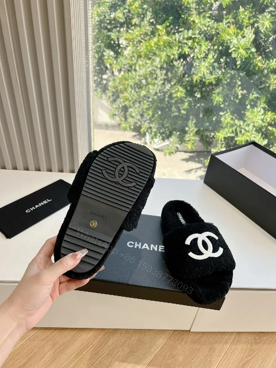 View 6 of Cozy Black Plush Slippers with Logo Detail