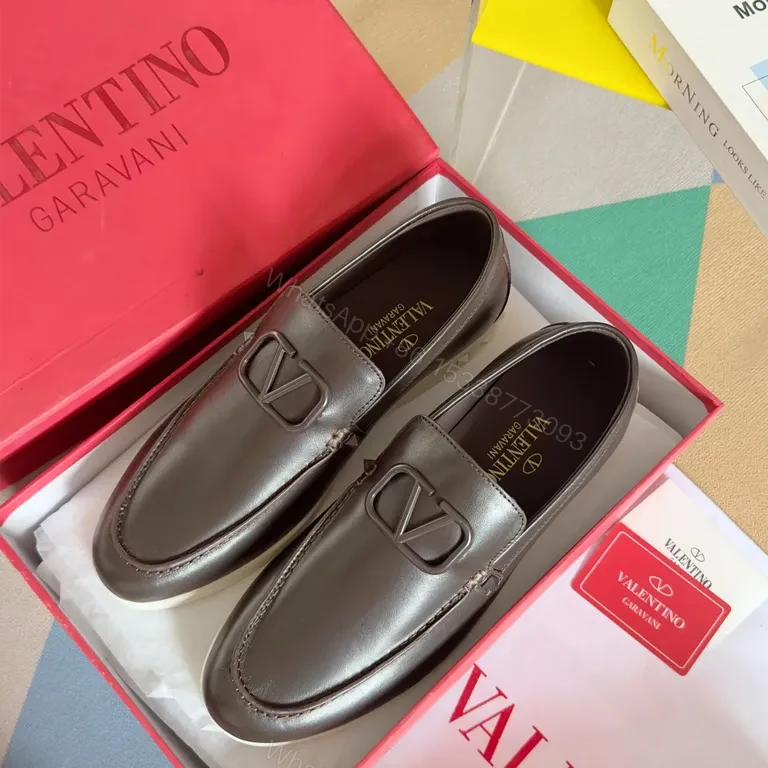 View 9 of Sleek Leather Loafers with Signature Hardware, Black, Luxury Style