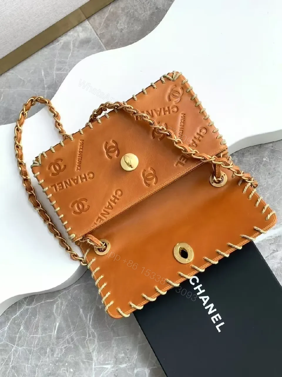 View 5 of Textured Leather Flap Bag with Gold Clasp, Whipstitch Accent, Crossbody Style