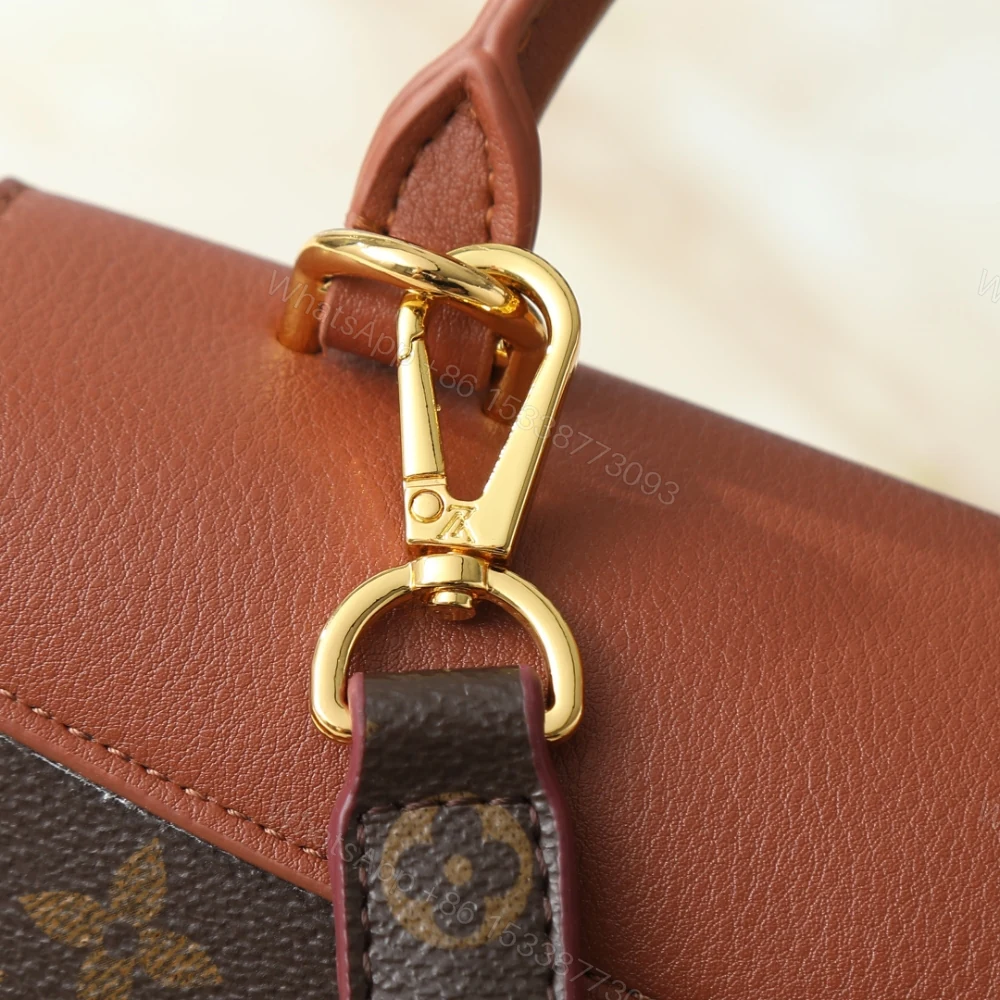 View 7 of Louis Vuitton Madeleine BB Monogram Cognac 24Cm M28288