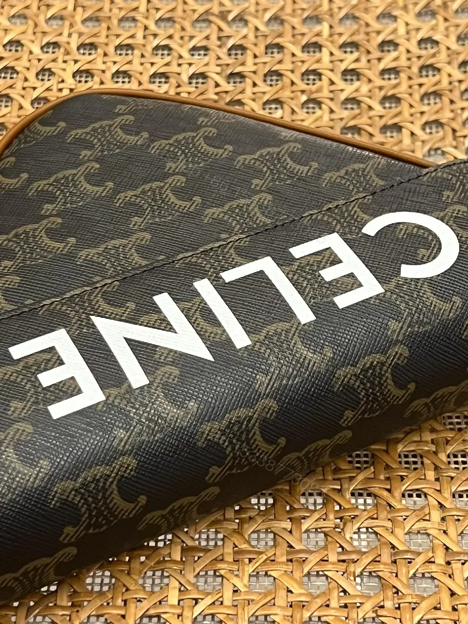 View 7 of Chic Black Monogram Cocoon Bag: Compact Luxury Crossbody