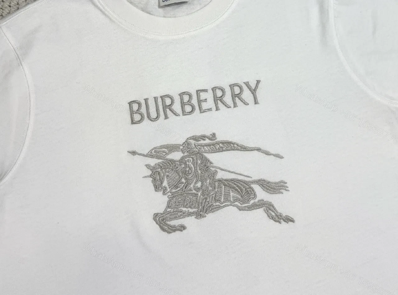 View 6 of White Cotton Tee with Metallic Crest Detailing, Premium Casual Style