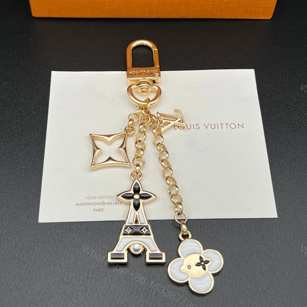 View 8 of Louis Vuitton Lv Bag Charm Key Holder