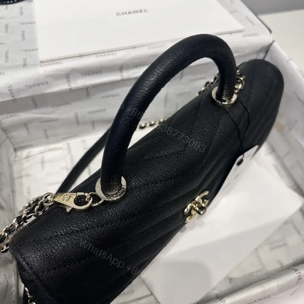 View 10 of Chic Quilted Leather Handbag: Gold Logo Compact Bag