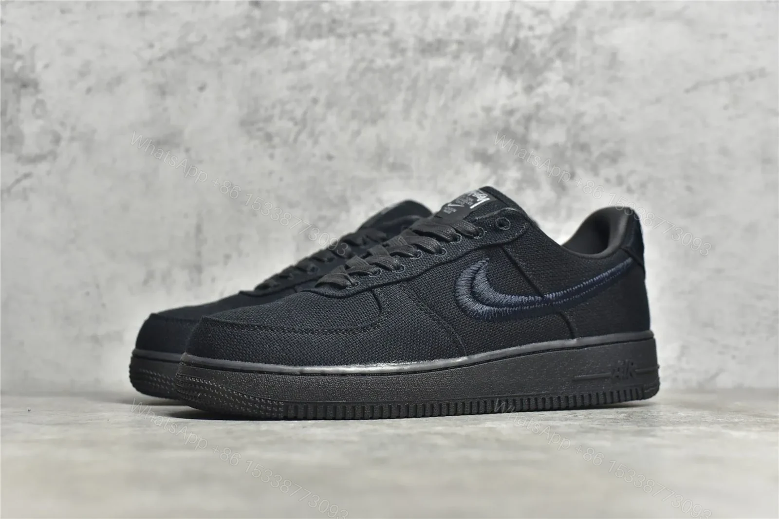 View 2 of Stussy X Air Force 1 Low Triple Black Reps