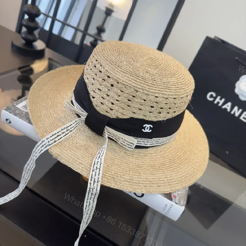 View 9 of Natural Straw Fedora Hat with Bow Ribbon Detail - Chanel Logo