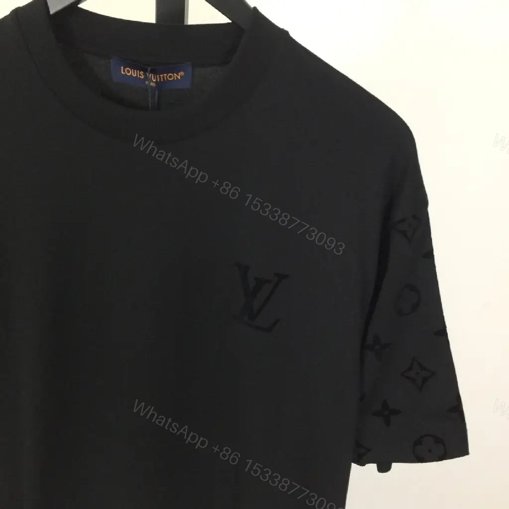 View 7 of Oversized Black Tee with Signature Embellishments — Modern Minimalism
