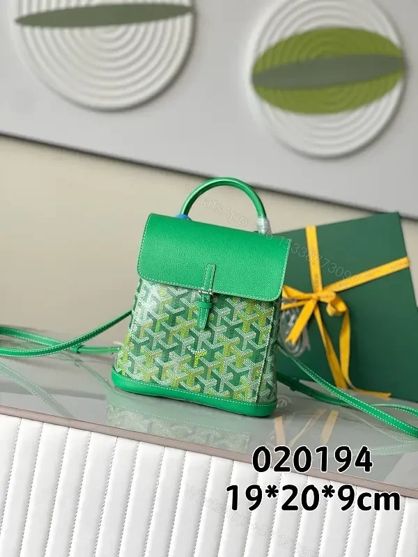 green leather mini backpack with monogram pattern and luxury green trim for everyday use — view 1