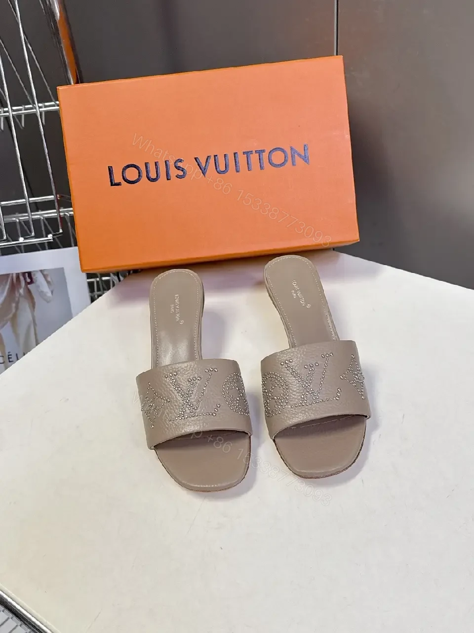 View 6 of Minimalist Taupe Leather Slides with Rhinestone Logo Embellishment