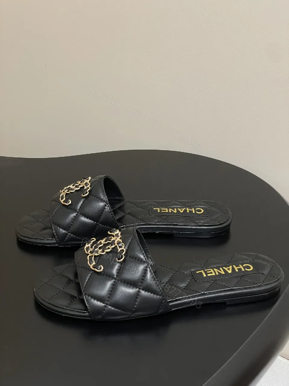 View 6 of Quilted Leather Slides with Gold Chain Detail Luxury