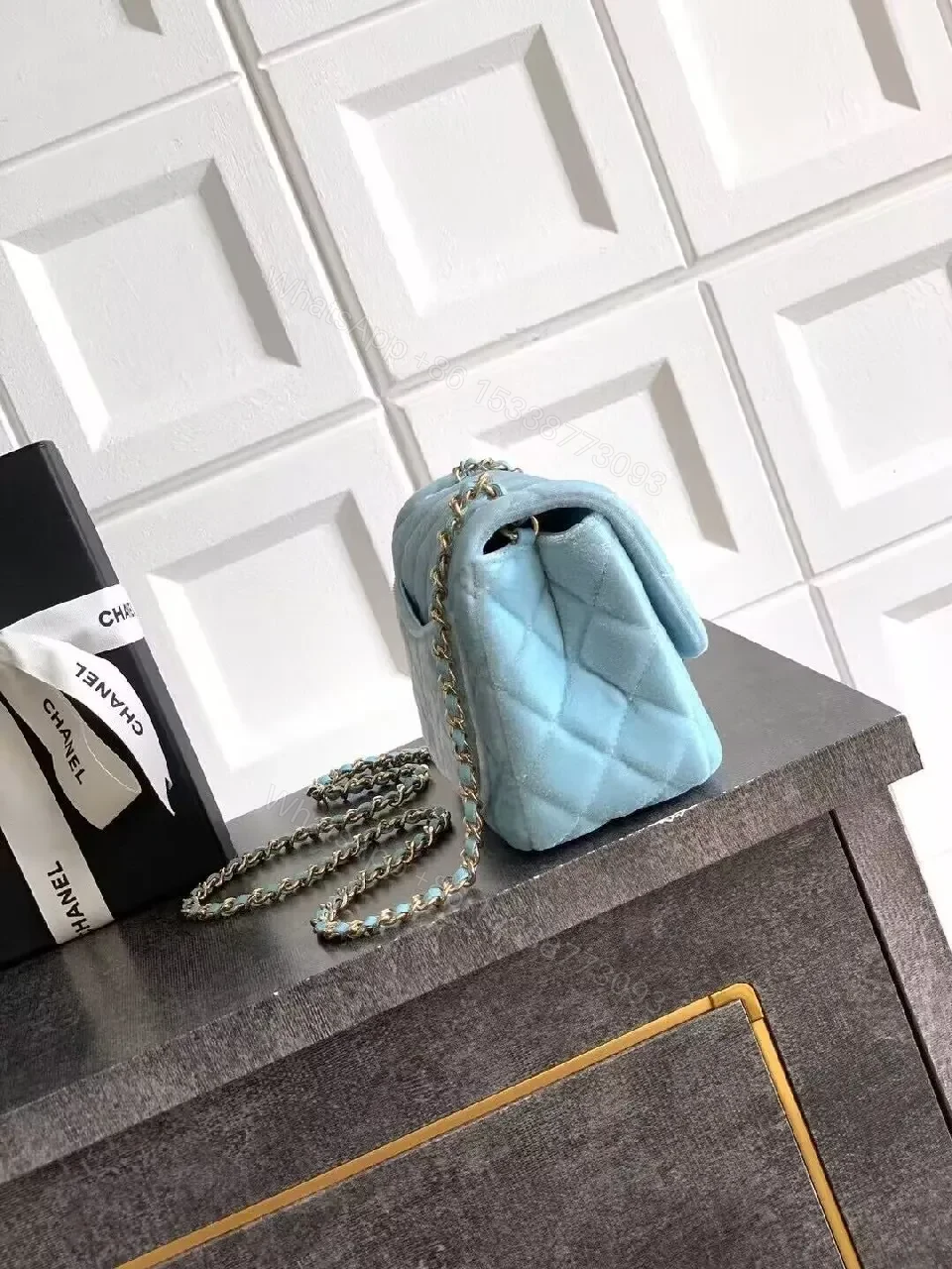 View 3 of Sky-Blue Quilted Mini Bag: Diamond Pattern, Gold Hardware, Crossbody Versatile