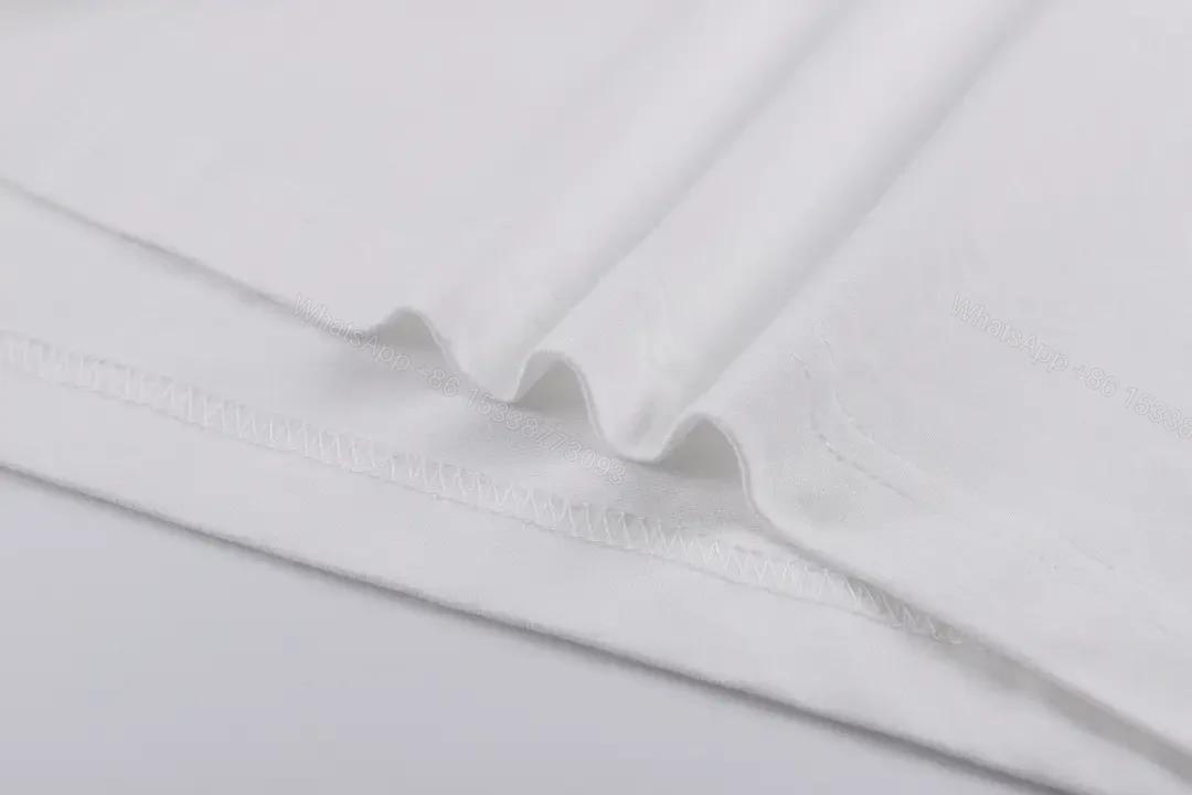 View 11 of Minimalist White Tee with Subtle Burberry Collar Detail