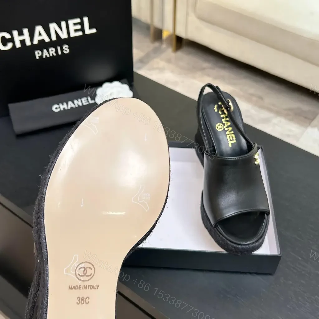 View 3 of Chic Black Leather Wedge Sandals - Gold Emblem, Open Toe, Slingback