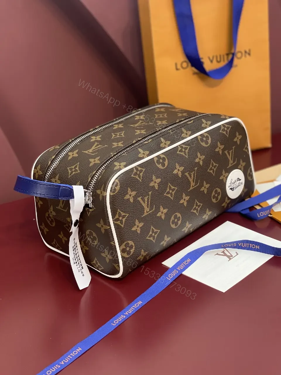View 10 of Blue Leather Trim Toiletry Bag: Monogram Canvas, LV Zippers, Adjustable Strap