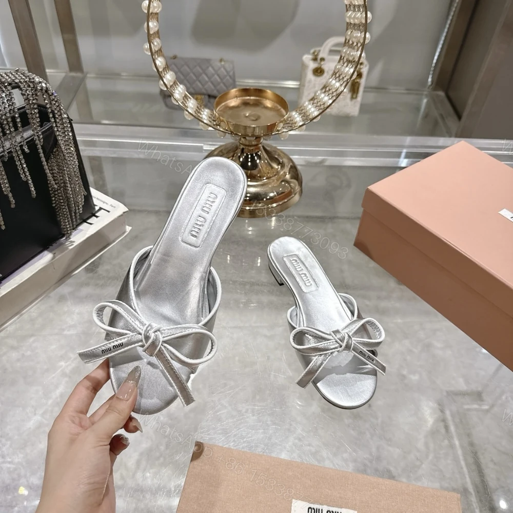View 4 of MIUMIU MORDORÉ NAPPA SANDALS WITH BOW SILVER