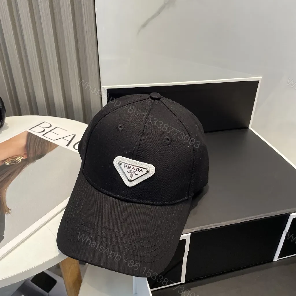 View 2 of Black Cotton Cap with Subtle Triangle Patch Capes?