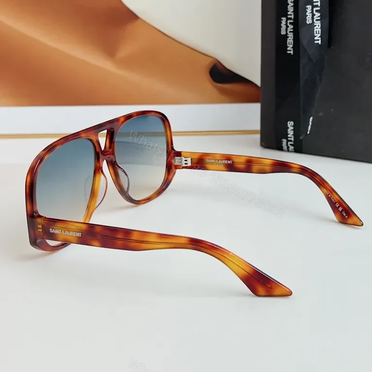 View 3 of Bold Saint Laurent Sunglasses â€“ Oversized Shield Frame, Gradient Lenses
