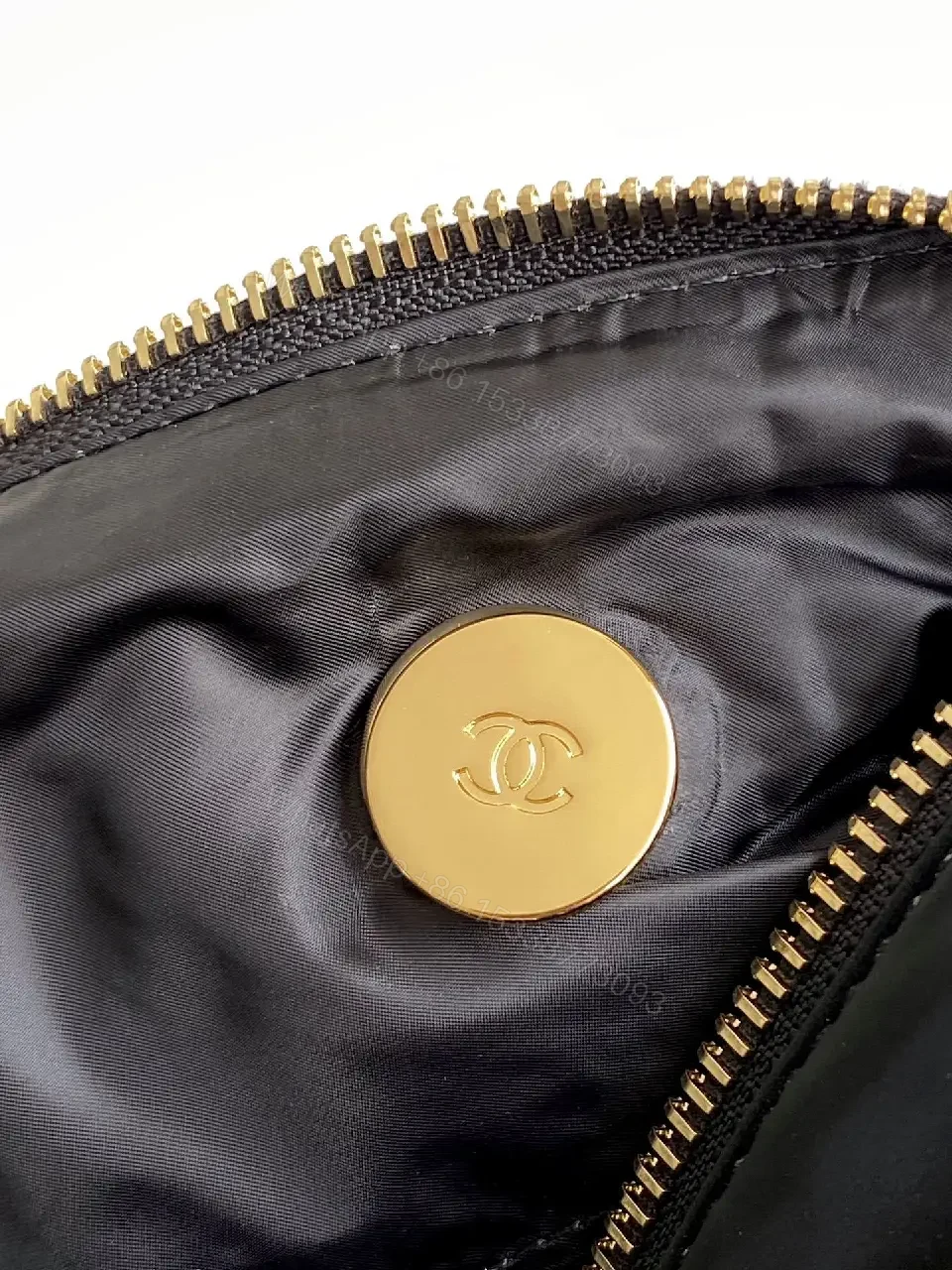 View 4 of Quilted Black Bag with Gold Chain - Compact Chic Signature