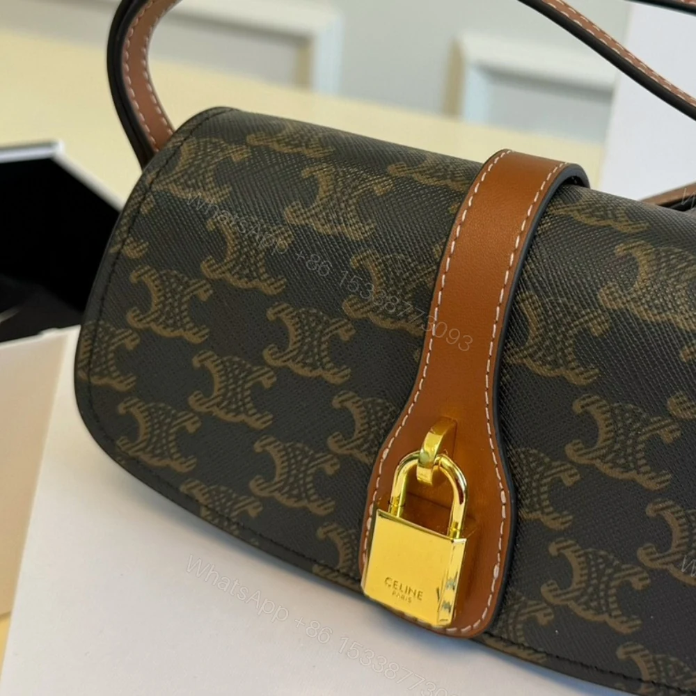 View 7 of CELINE CLUTCH ON STRAP TABOU IN TRIOMPHE CANVAS AND CALFSKIN TAN 20CM 10I592DQ2 04LU