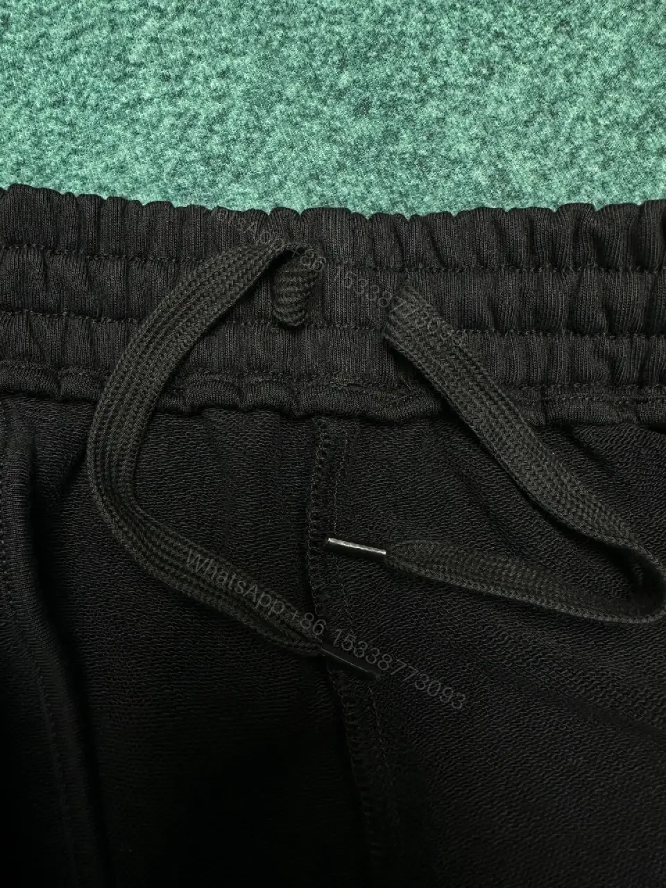 View 3 of Black Quick-Dry Swim Shorts | Minimalist, Structured, All-Day Comfort