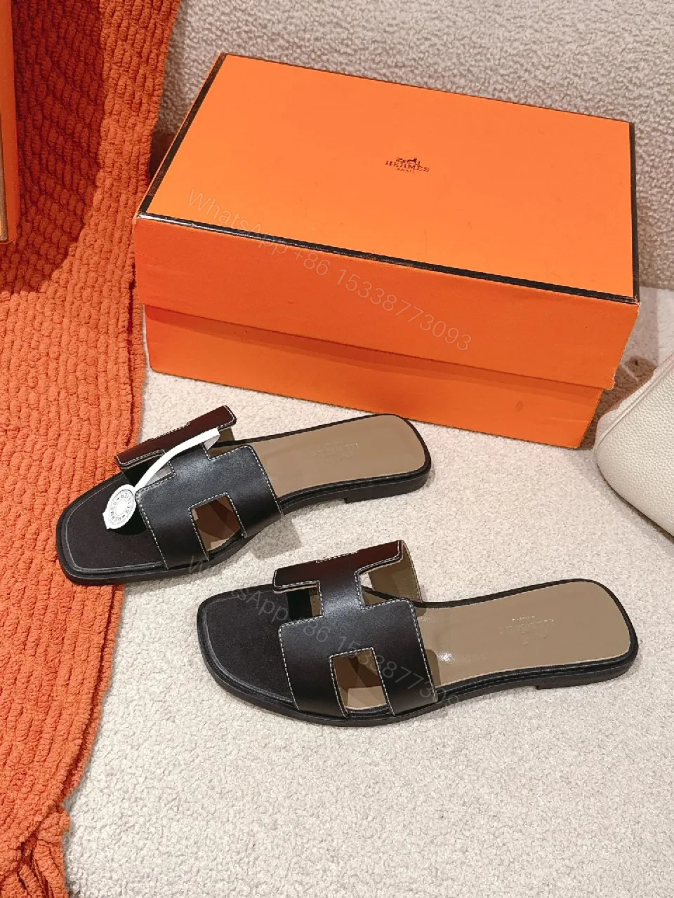Patterned Stride Sandals in Black Leather – Luxury Flat Slides — view 1