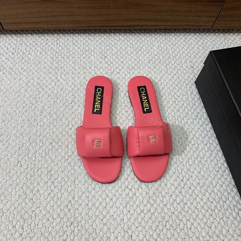 Pink Leather Slide Sandals Gold Chanel Logo Slipper Style Bow Accent Sandal — view 1