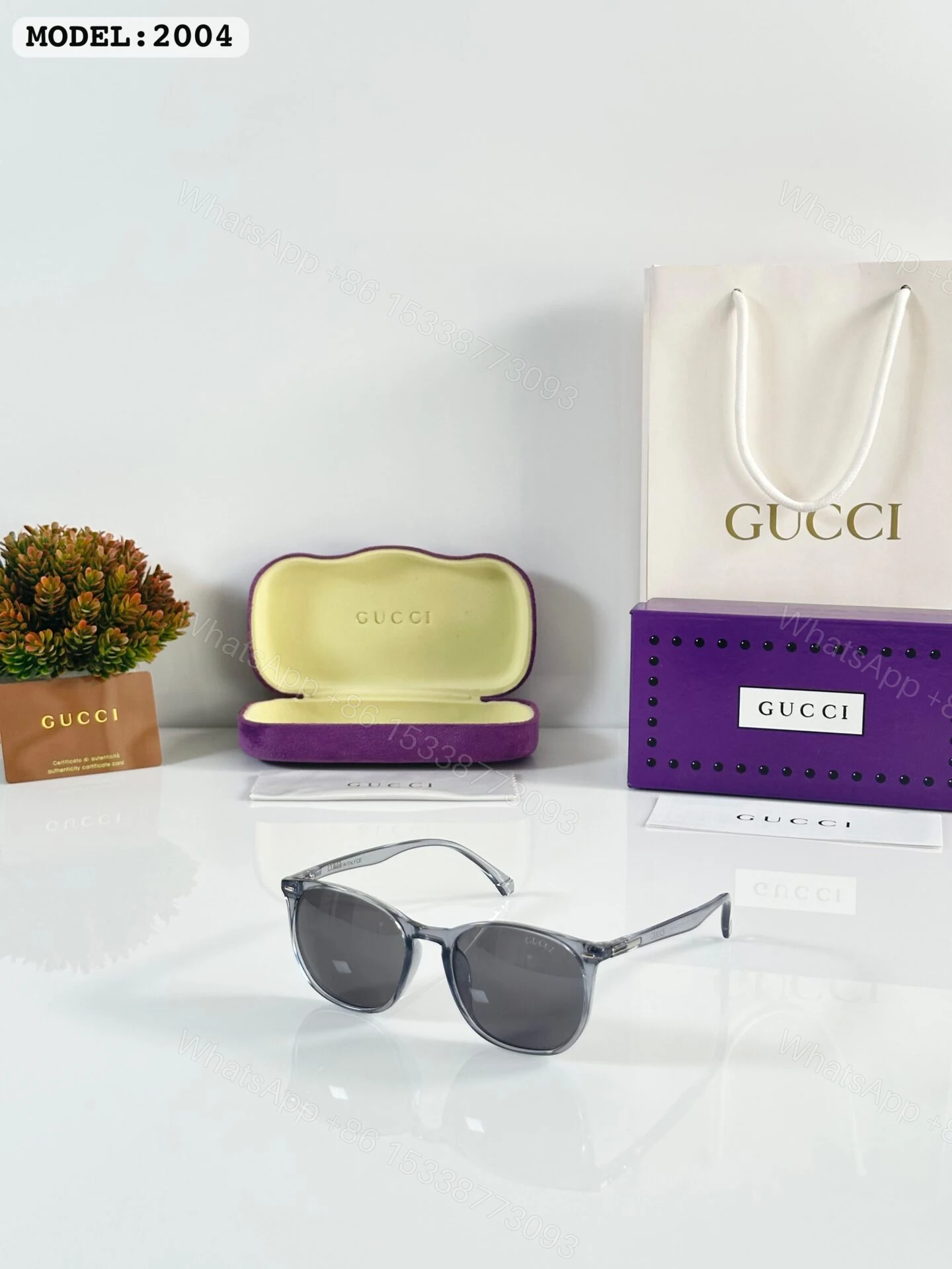 Gucci 2004 Transparent Gray Round Sunglasses — view 1