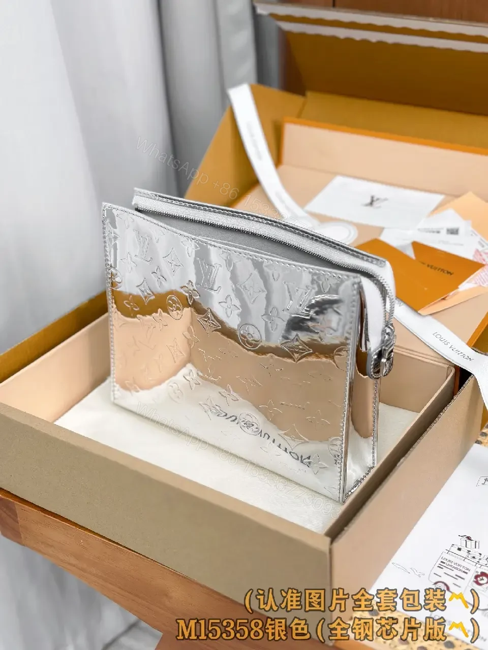 View 7 of Metallic Silver Pouch with Signature Motifs—Chic All-Day Gleam