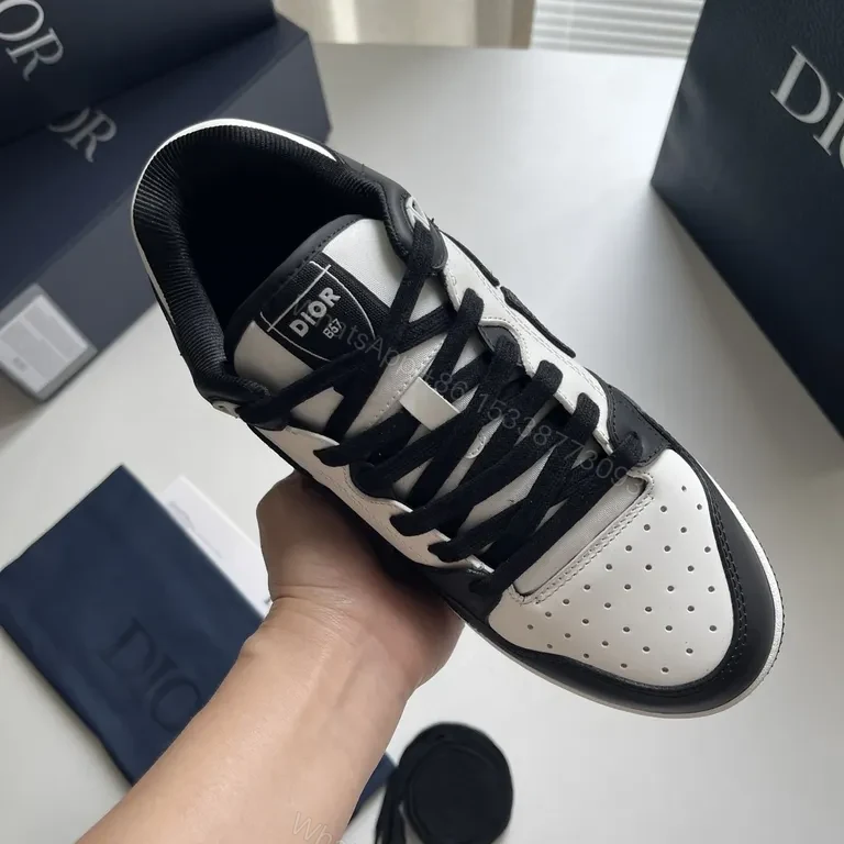 View 6 of Bold Contrast Leather Sneakers - Dior-Detail Black & White High-Impact Shoes