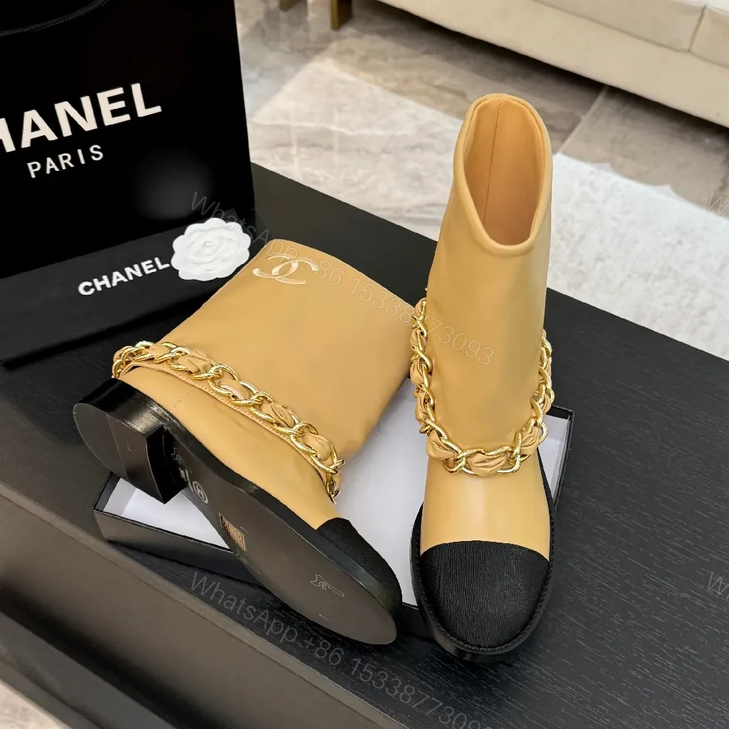 View 8 of Chic Tan Leather Boots with Black Toe Cap and Chain Detail