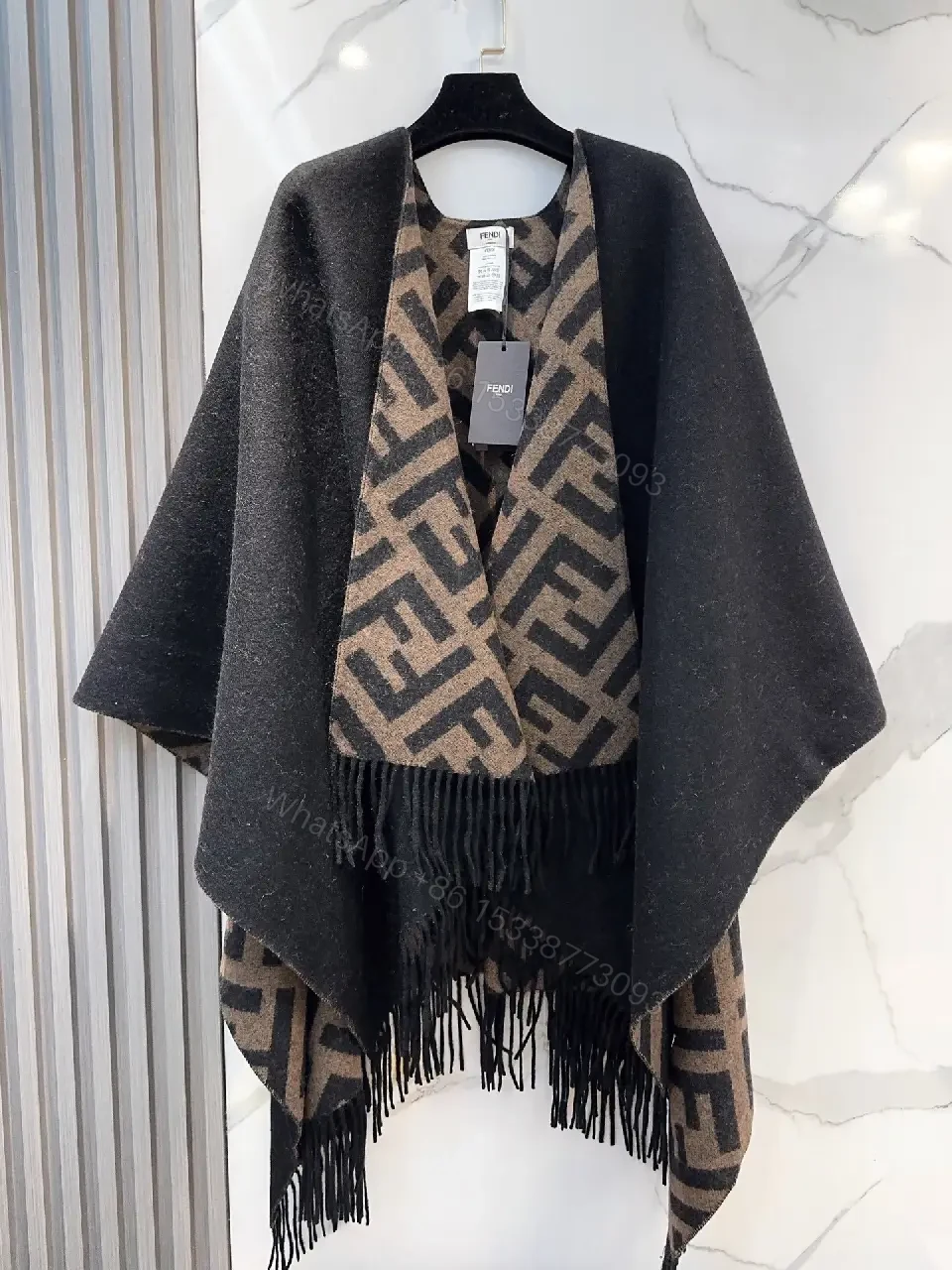 Chic Monogram Wool Poncho with Fringe Details — view 1
