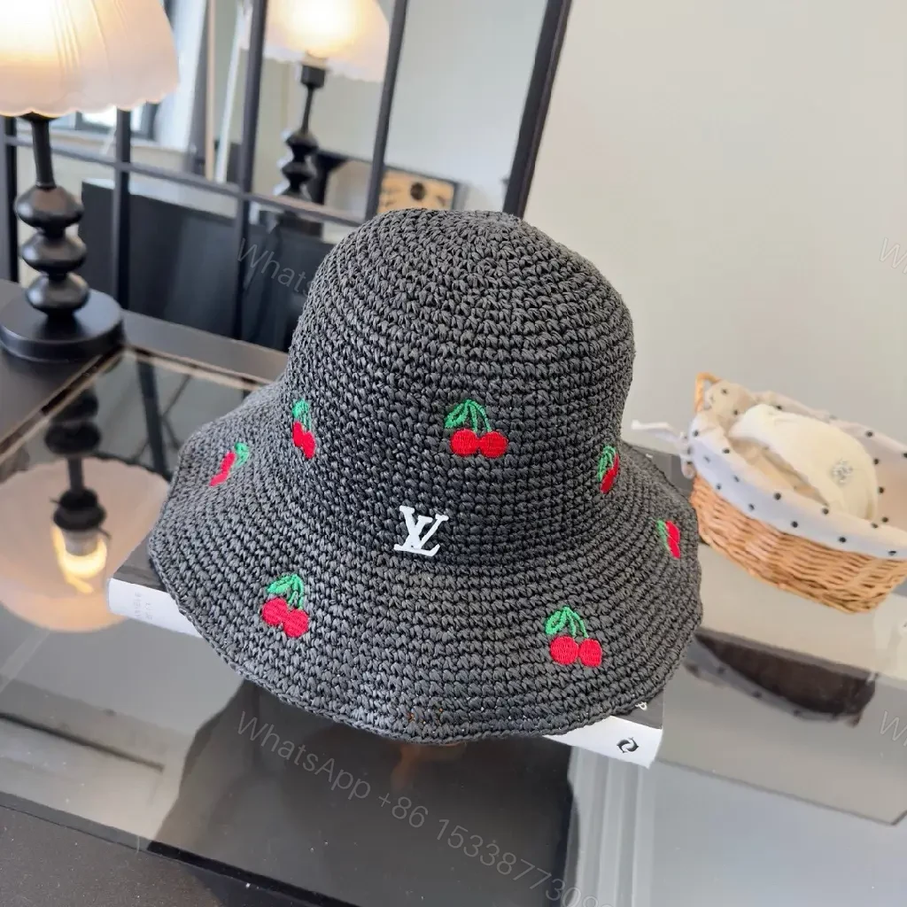 View 5 of Charcoal Crochet Bucket Hat with Cherry & LV Accent