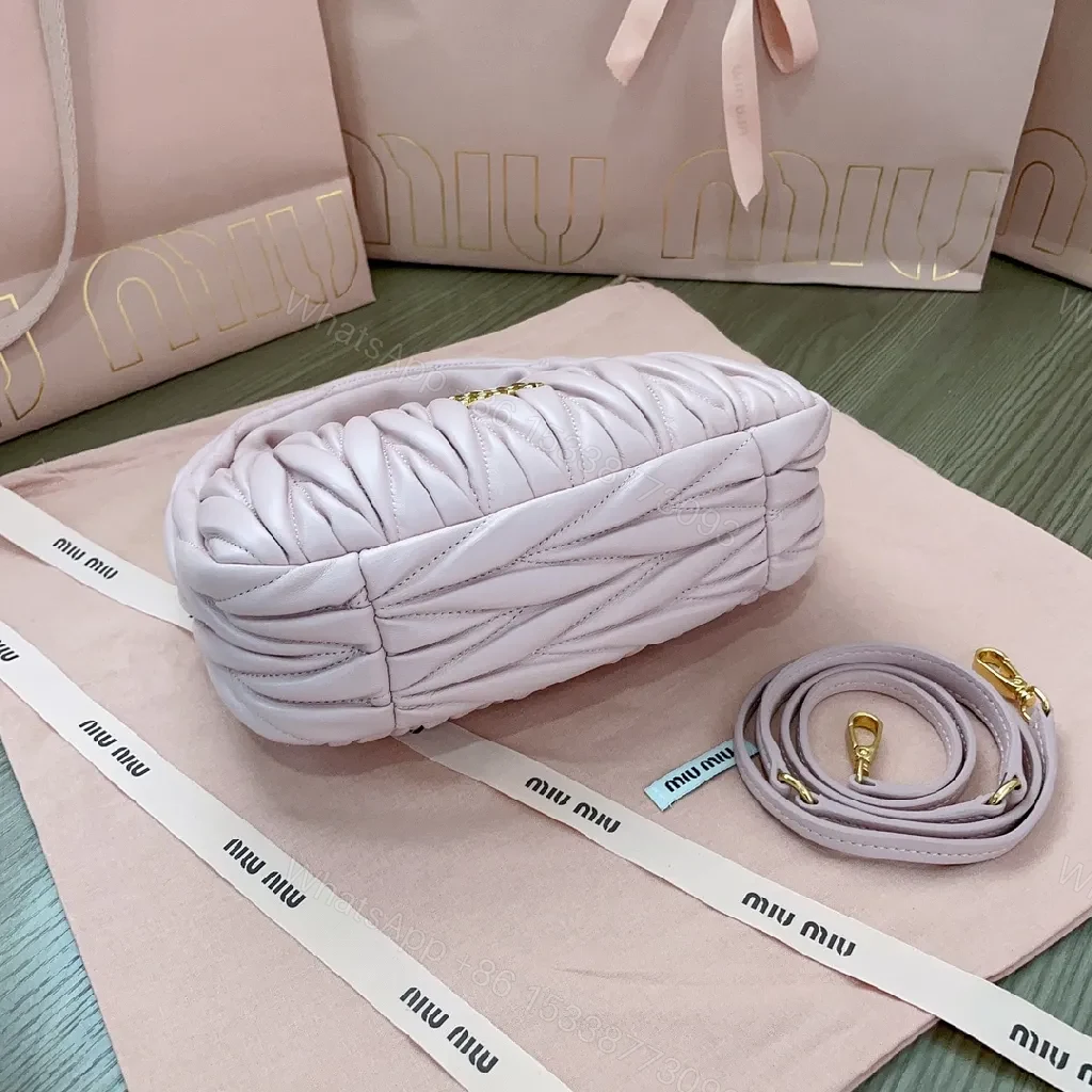View 5 of Soft-Quilted Lavender Mini Bag: Luxury-Texture, Gold Hardware, Crossbody