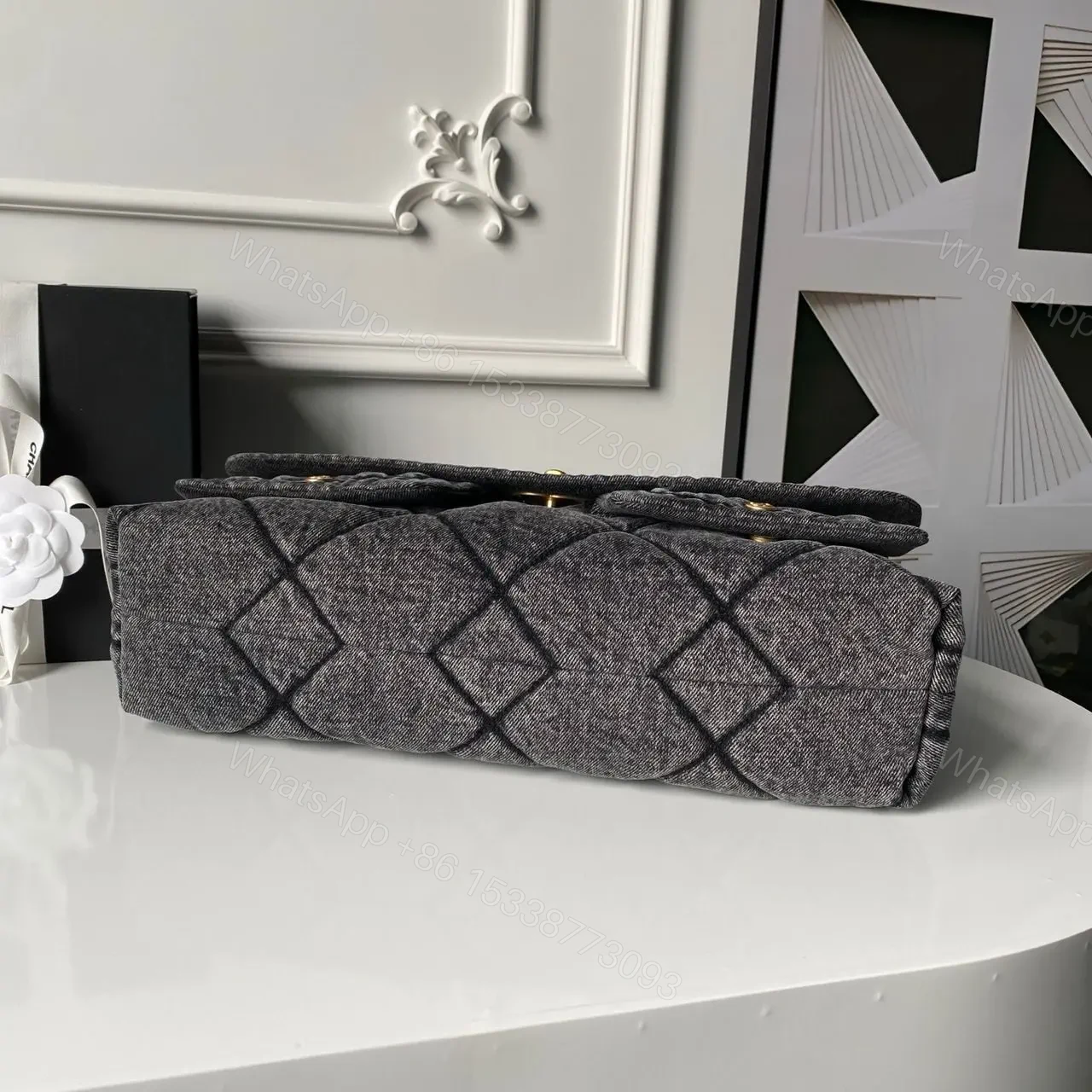 View 5 of Chanel Maxi Flapbag in washed denim with gold-tone metal hardware
