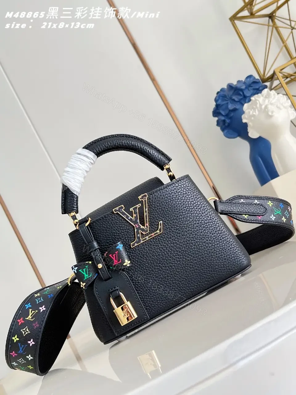Mini Black Satchel: Pebbled Leather, Gold Hardware, Bold Accent — view 1