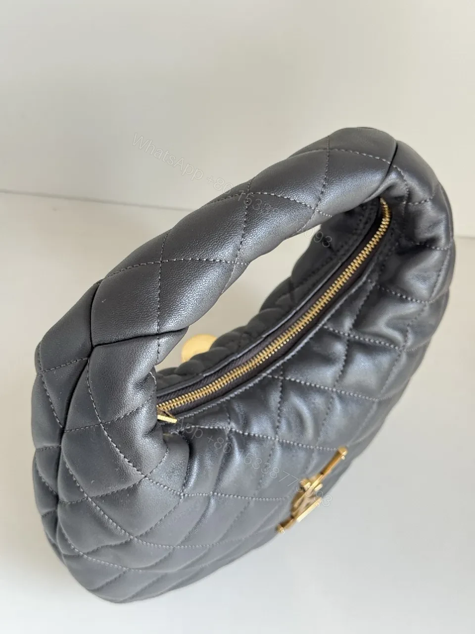 View 7 of Quilted Mini Bag with Gold Logo – Elegant Everyday Carry