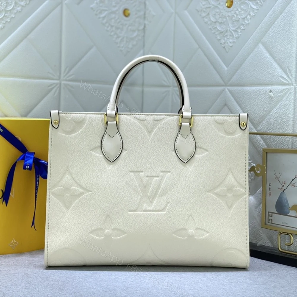 View 2 of Louis Vuitton Onthego MM Monogram Empreinte Beige 35Cm