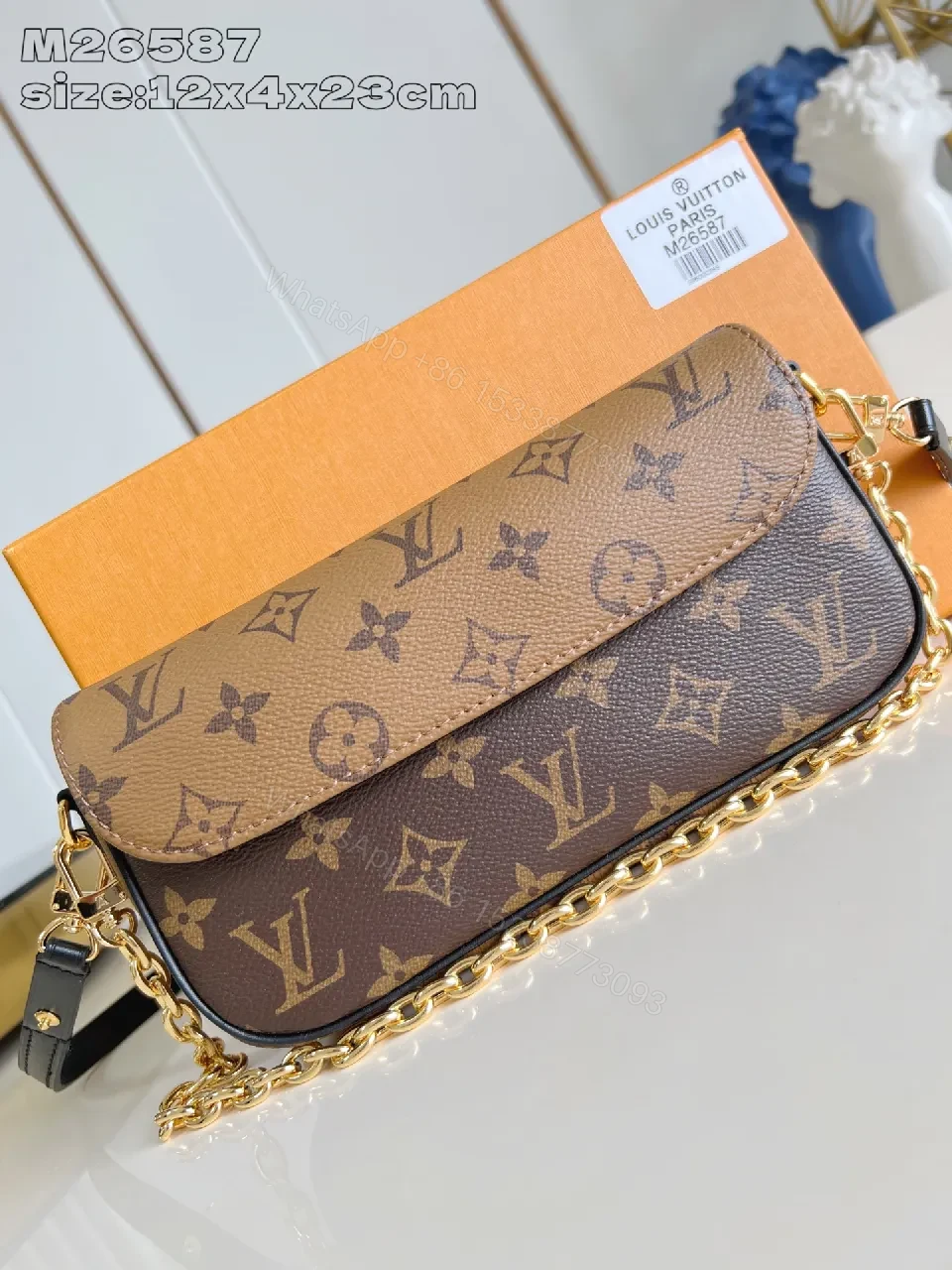 View 5 of Compact Dual-Tone Monogram Messenger: Subtle Luxury Bag